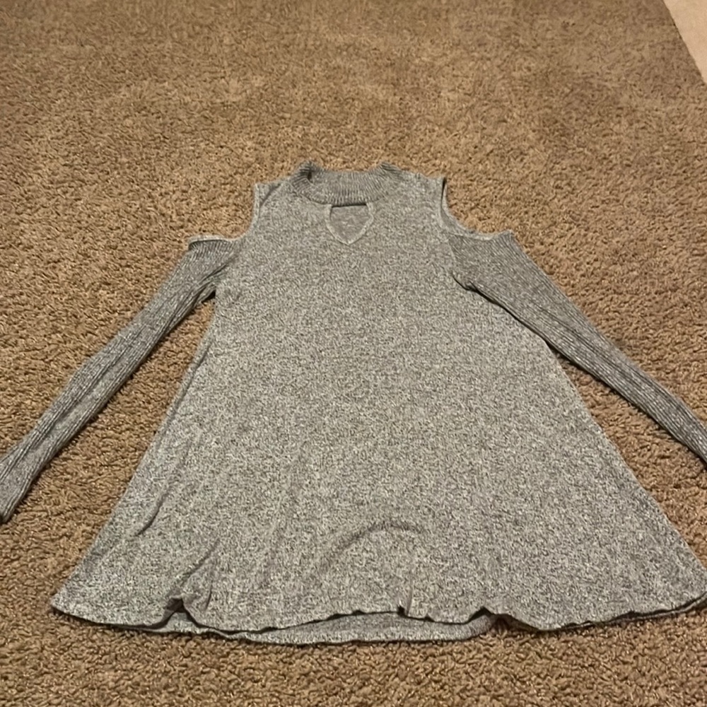 Woman’s grey mid length dress